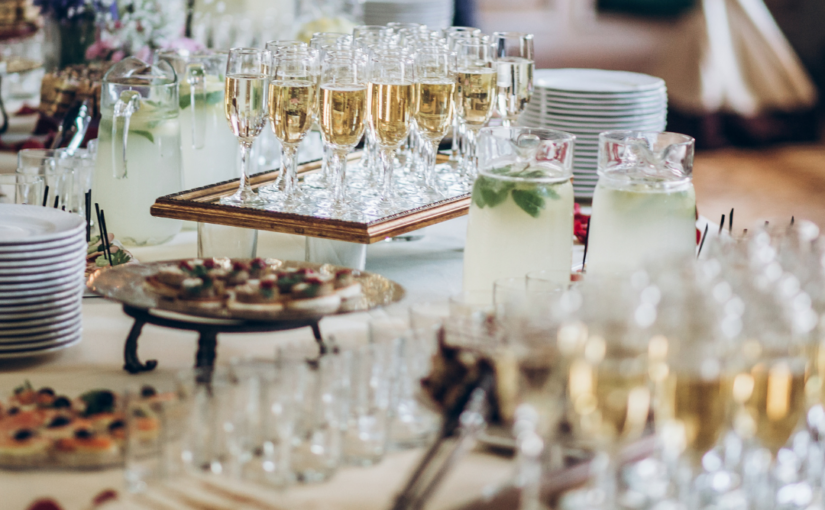 Event planner using digital tools like iStratus to organize timelines, vendors, and event details