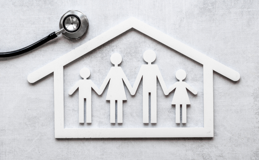 Parent using digital tools in family health management with iStratus to organize medical records and appointments